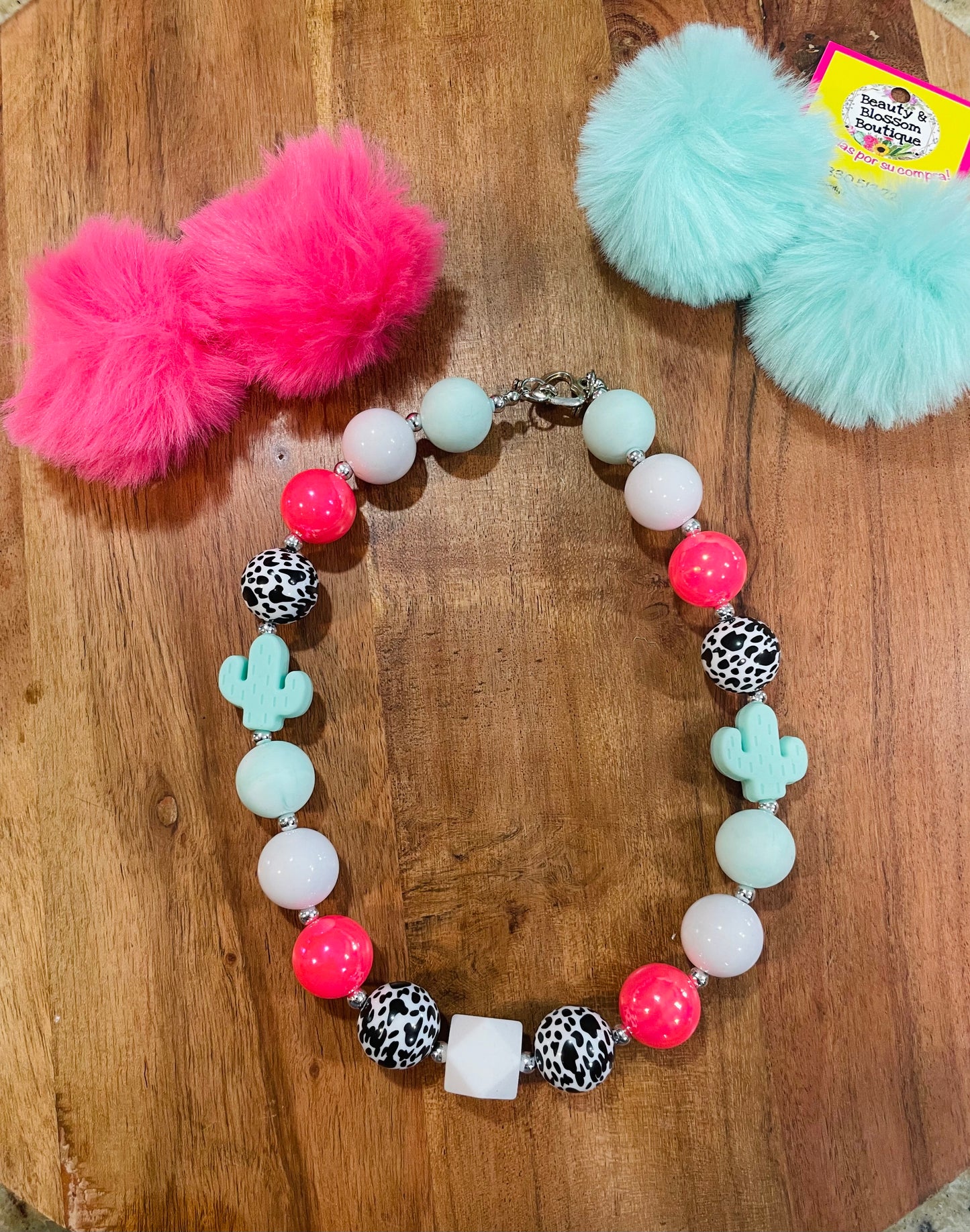 TURQUOISE POM POM CLIP ON EARRINGS