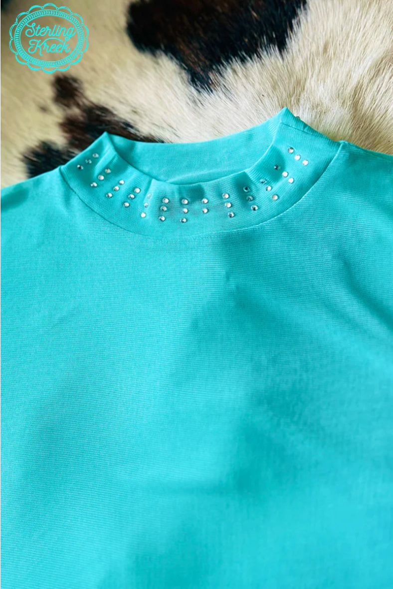 TURQUOISE TROUBLE TOP